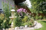 ferienhaus-buching_garten-brunnen