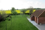 fewo-daschke_ferienhaus-ostseewind-aussenansicht-garten