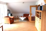 ferienwohnung-hayenort_hayenland-wohnzimmer-mit-kaminofen